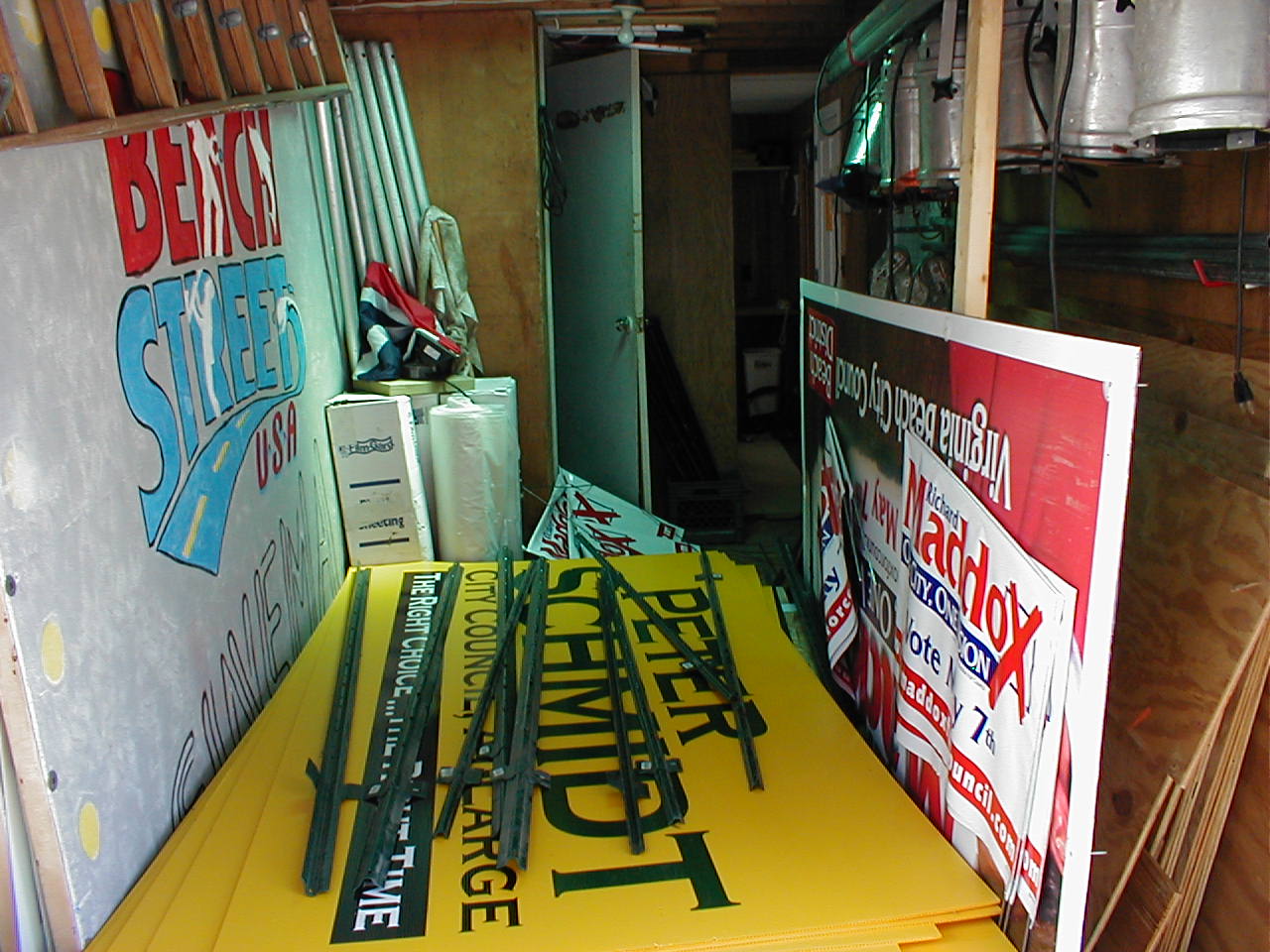 Political signs share trailer on city park property